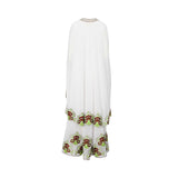 The back view of the white Mijade Fashion kaftan set, showing the flowing cape and the continuation of the floral embroidery and silver scalloped trim along the bottom edge.