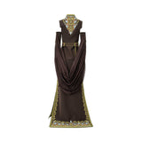 Long sleeveless embroidered gown with intricate multicolour patterns, fitted waist detail, and a flowing silhouette, photographed on a white background.