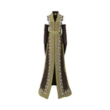 Long sleeveless embroidered gown with intricate multicolour patterns, fitted waist detail, and a flowing silhouette, photographed on a white background.