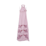 Pink halter-neck embroidered evening gown with delicate beadwork motifs, slim silhouette, and floor-length hem, photographed on a white background.