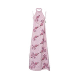 Pink halter-neck embroidered evening gown with delicate beadwork motifs, slim silhouette, and floor-length hem, photographed on a white background.