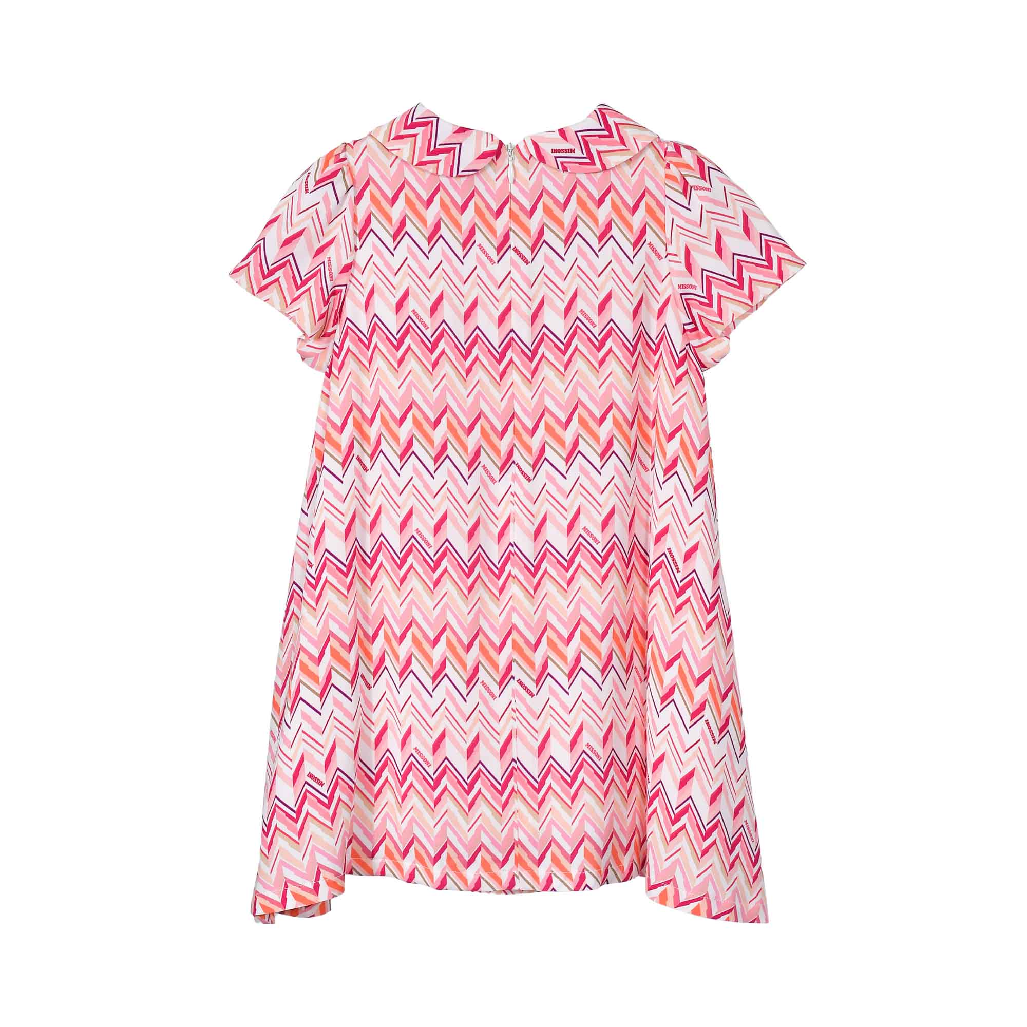 Back view of the pink Missoni baby dress, highlighting the continuous chevron print and a clean, concealed central zipper closure.