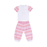 Back layout view of the Missoni baby girl outfit, showing the clean back of the white top with a snap-button placket and the continuous chevron print on the trousers.