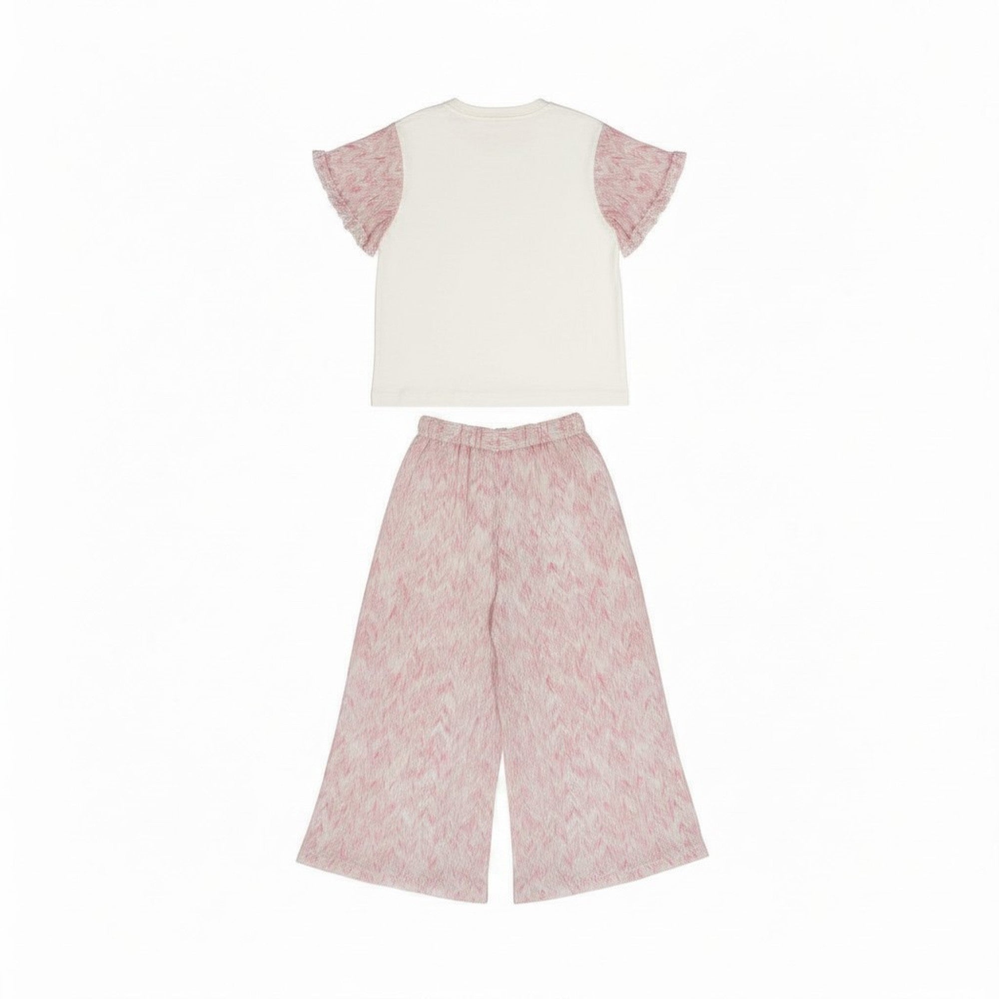 Back full view of the Missoni kids casual coordinates set showing the plain off-white back of the top and the fluid drape of the patterned pink wide-leg trousers.