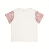 Back close-up view of the Missoni kids off-white cotton T-shirt, showing the clean seams and the contrast pink abstract print short sleeves.