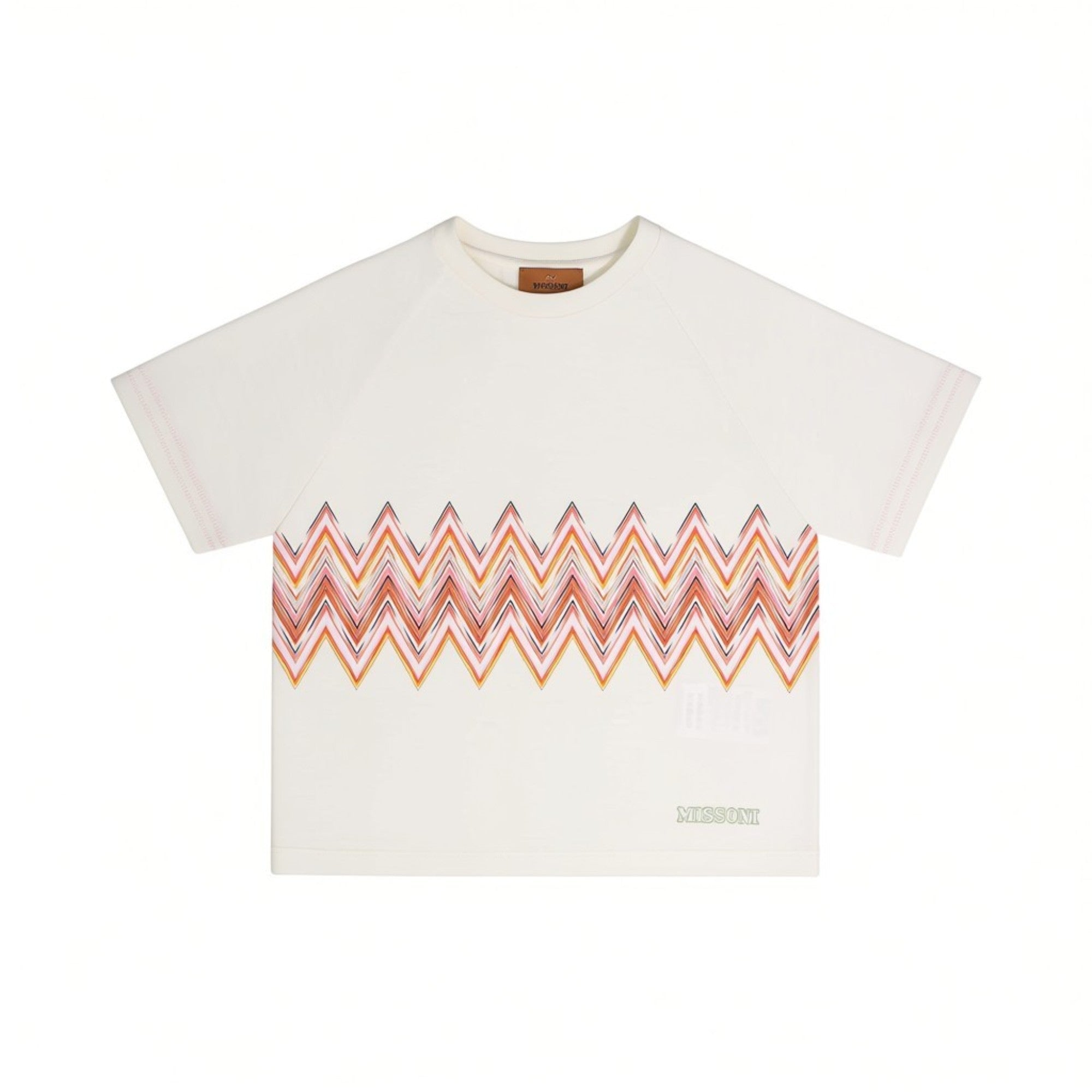 Front close-up view of the Missoni kids white crewneck T-shirt, highlighting the vibrant signature zigzag logo graphic on the chest.