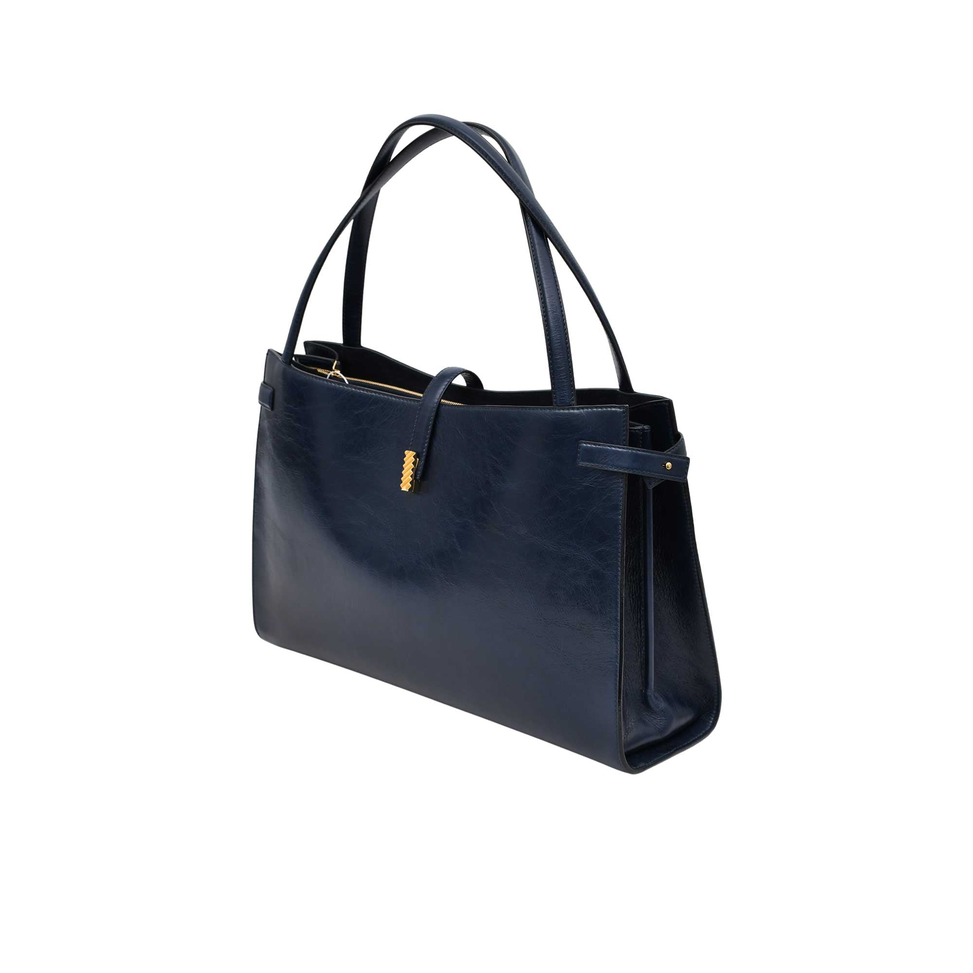 Navy handbag on a white background.