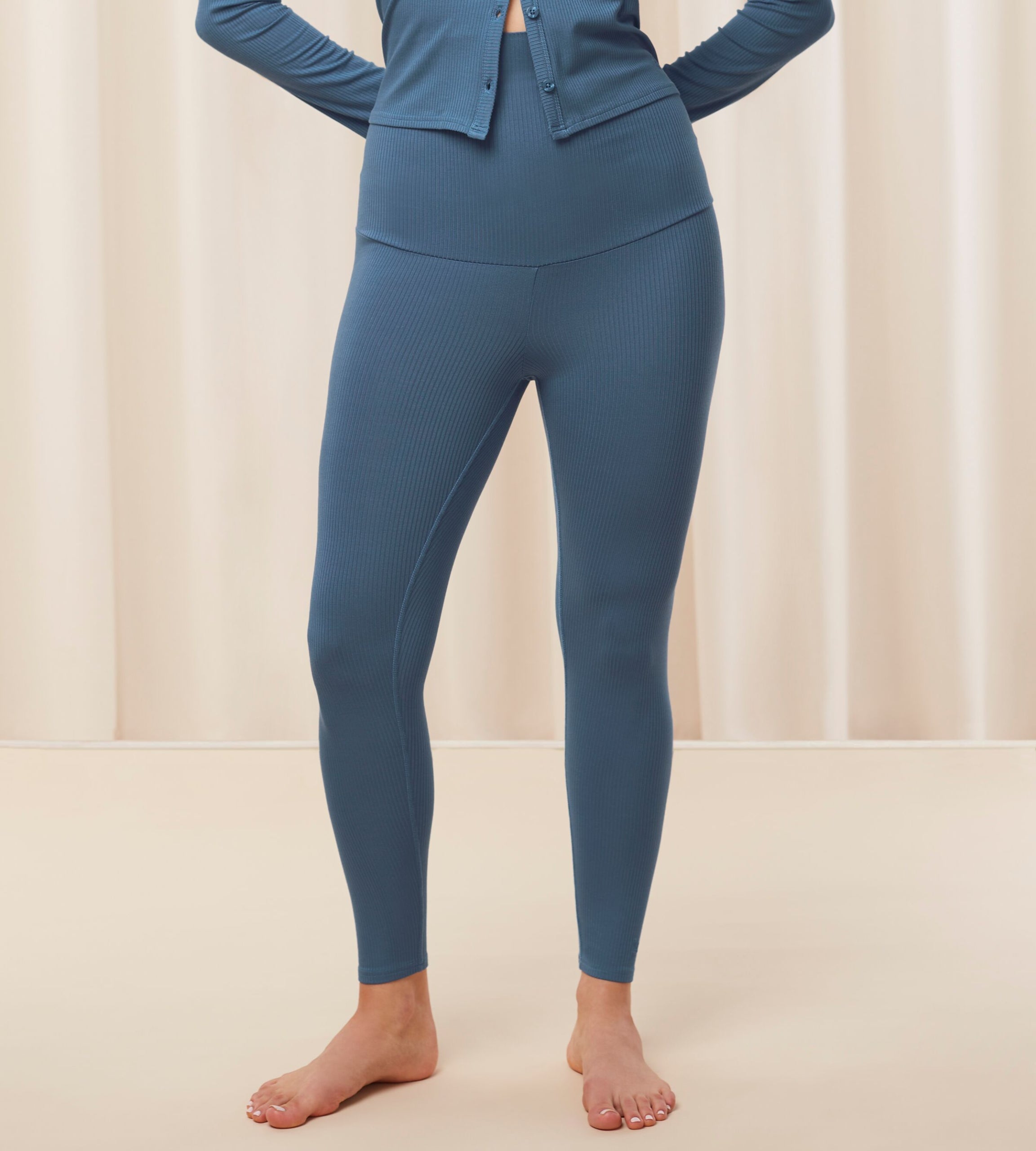 Model Front view of the Triumph Natural Spotlight blue rib comfort stretch trousers, highlighting the pregnancy-friendly waistband and wide-leg cut. Shop Online
