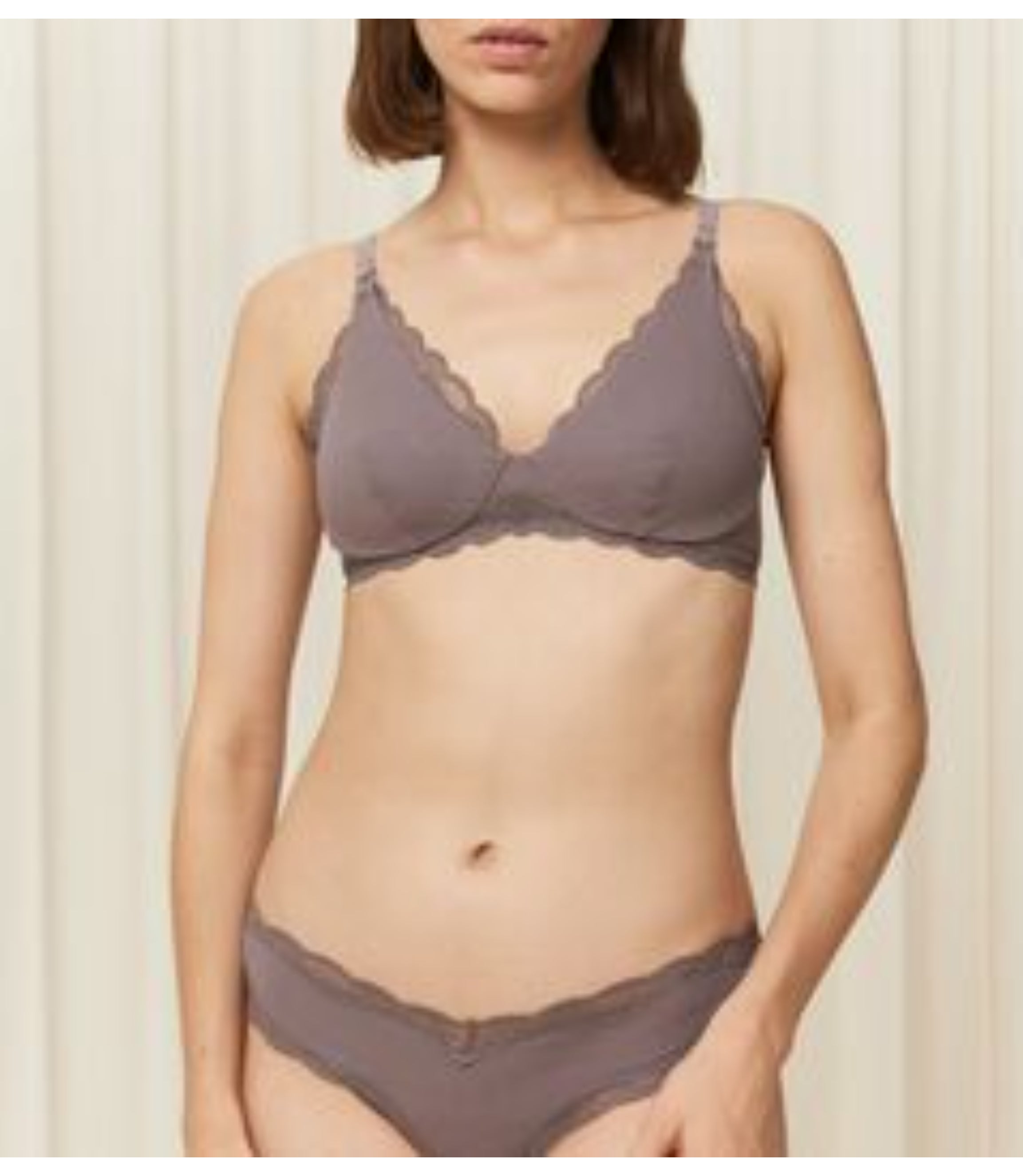 Model front view of the Triumph Natural Spotlight grey maternity bra, showing the nursing clips and soft, eco-friendly fabric. Available Online Now