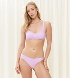 Model full front view of the Triumph Flex Smart Summer light purple (Sweet Crocus) Brazilian bikini bottoms, showing the seamless edges and cheeky cut.