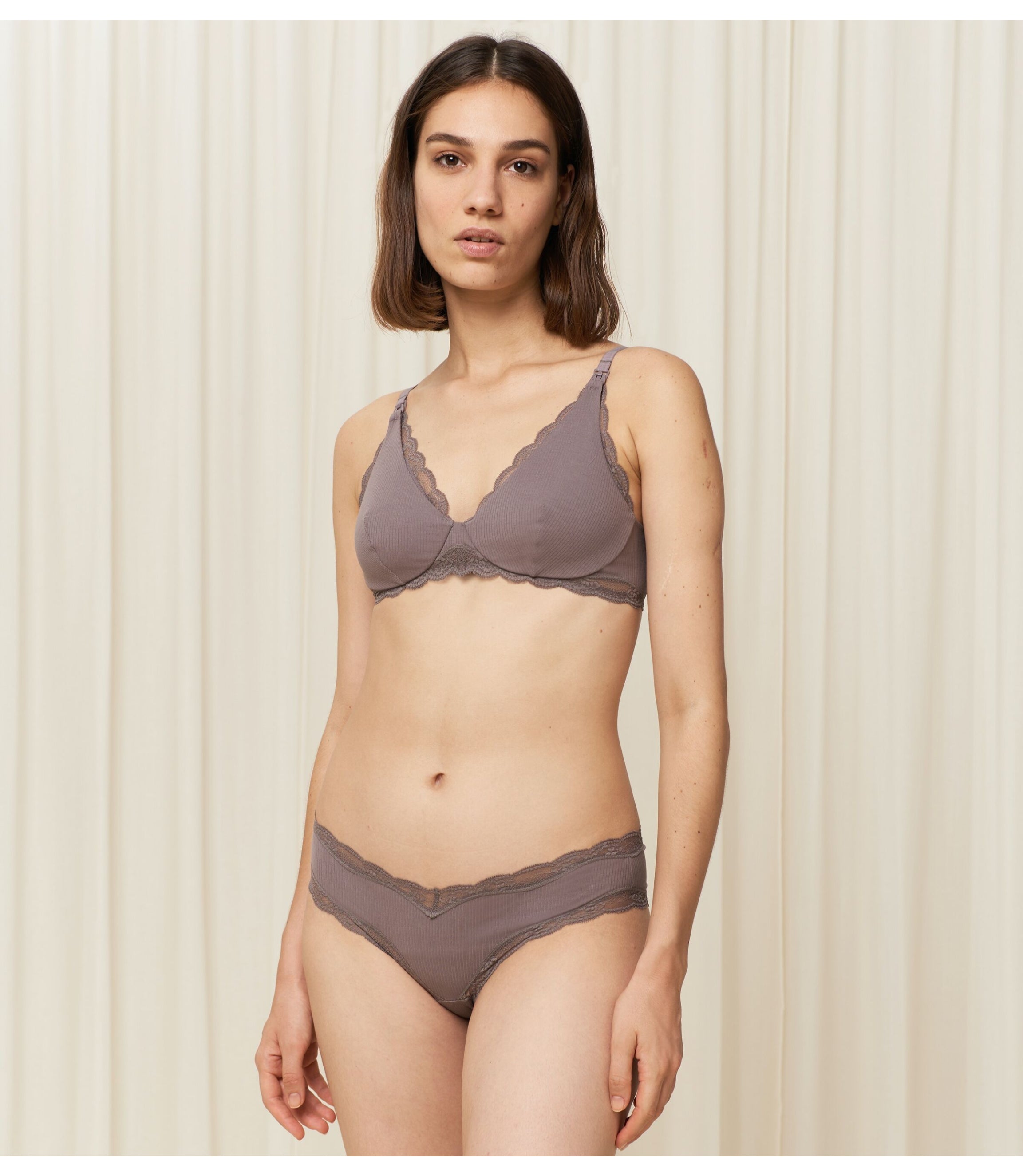 Model full front view of the Triumph Natural Spotlight grey maternity bra, showing the nursing clips and soft, eco-friendly fabric. Available Online Now