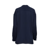 Back view of the Momoni navy blue silk blouse, showcasing its clean relaxed fit, dropped shoulder seams, and a horizontal back yoke detail.