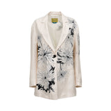 Front view of a Momoni single-breasted blazer in cream, featuring a prominent black and white sketchy floral print, notched lapels, and a single black button closure.