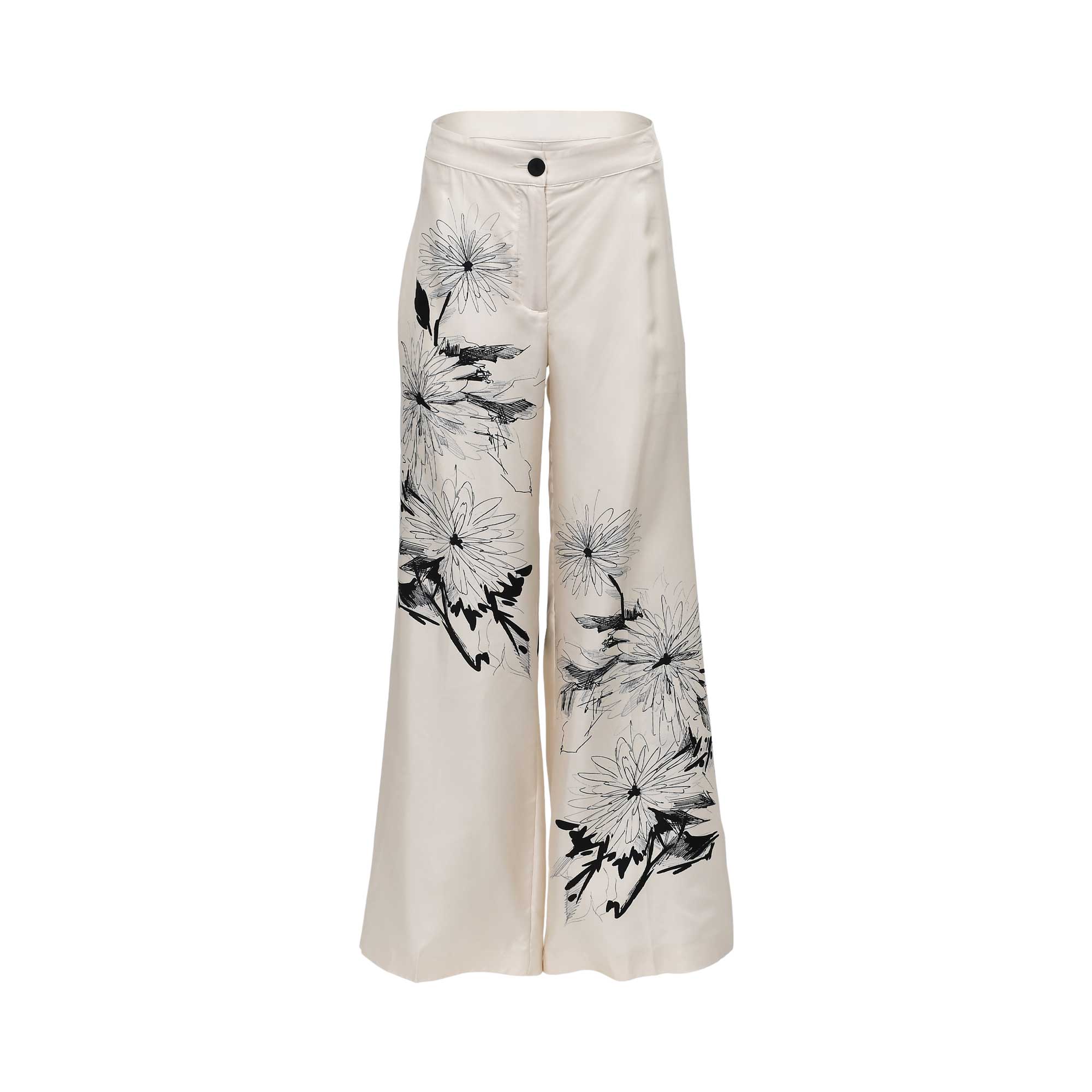 Front view of Momoni high-waisted wide-leg trousers in cream fabric, featuring a bold black and white sketchy floral print on the legs and a single button waist closure.