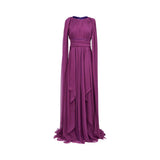 A full-length front view of a burgundy MOONMAINS floral lace gown featuring a high neck, long sleeves with flared cuffs, and a tiered skirt hem against a white background.