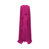 Back view of the MOONMAINS magenta crepe gown showing the hidden zipper closure and the fluid drape of the cape-effect sleeves.
