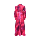Front view of a magenta and plum abstract ombre MOONMAINS maxi gown featuring a high collar, button-down front, and voluminous bishop sleeves.