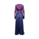 Rear view of the MOONMAINS two-tone gown showing the high-waisted navy skirt, purple bodice, back zipper, and laser-cut sleeve details.