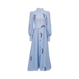 Front view of a sky blue MOONMAINS maxi gown featuring delicate bird and floral embroidery, a button-down front, and voluminous bishop sleeves.
