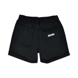 Rear view of the black shorts showing the gathered elastic waist and the white Moschino logo on the right pocket.