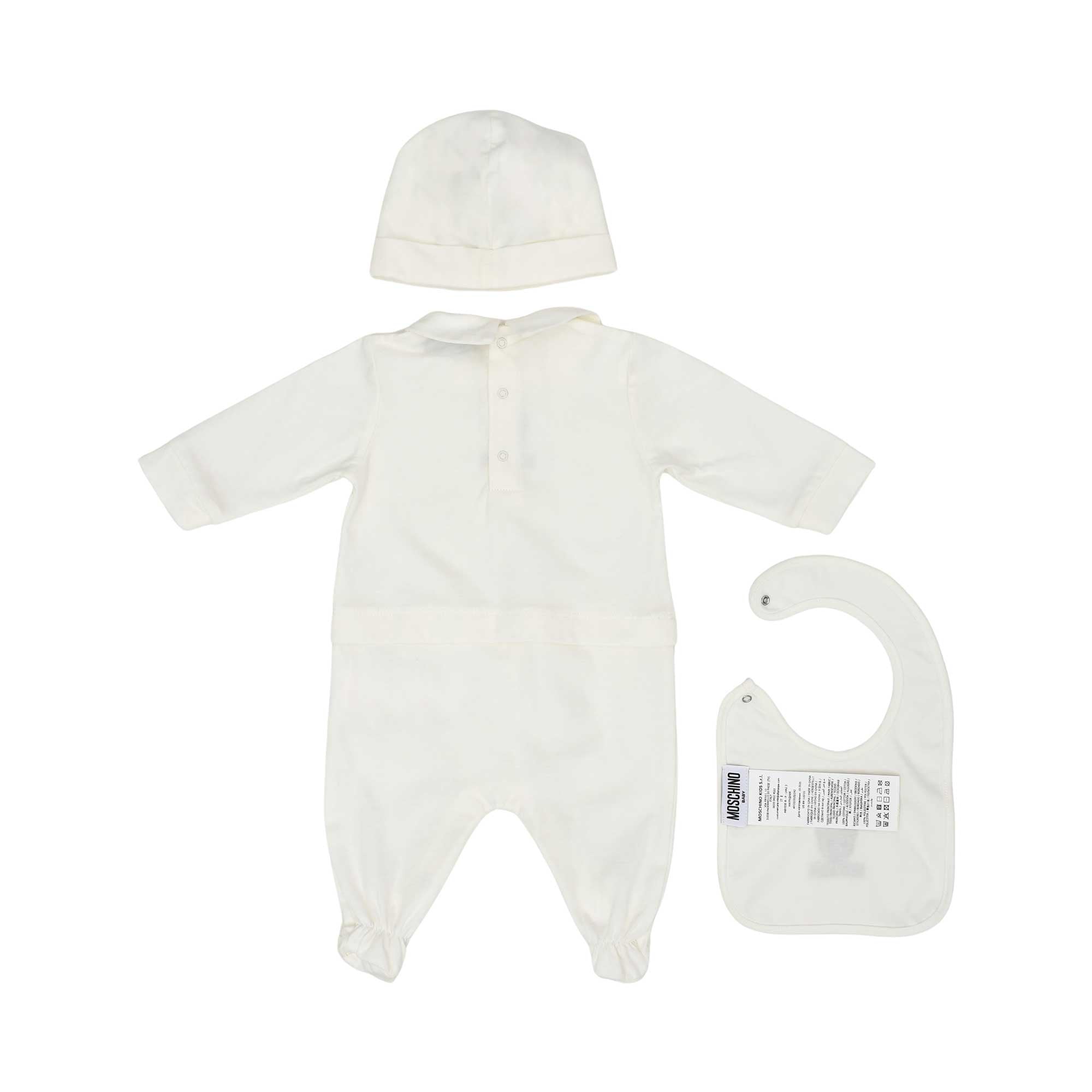 The rear view of the ivory baby set showing the popper fastenings on the back of the onesie and the side of the bib.