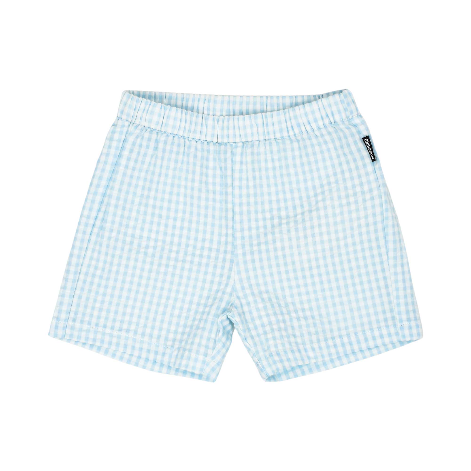 Close-up of the light blue and white gingham check shorts featuring a comfortable elastic waistband.