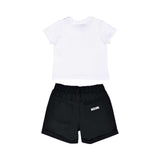 Rear view of the Moschino set showing the clean white T-shirt back and black shorts with a branded rear pocket.
