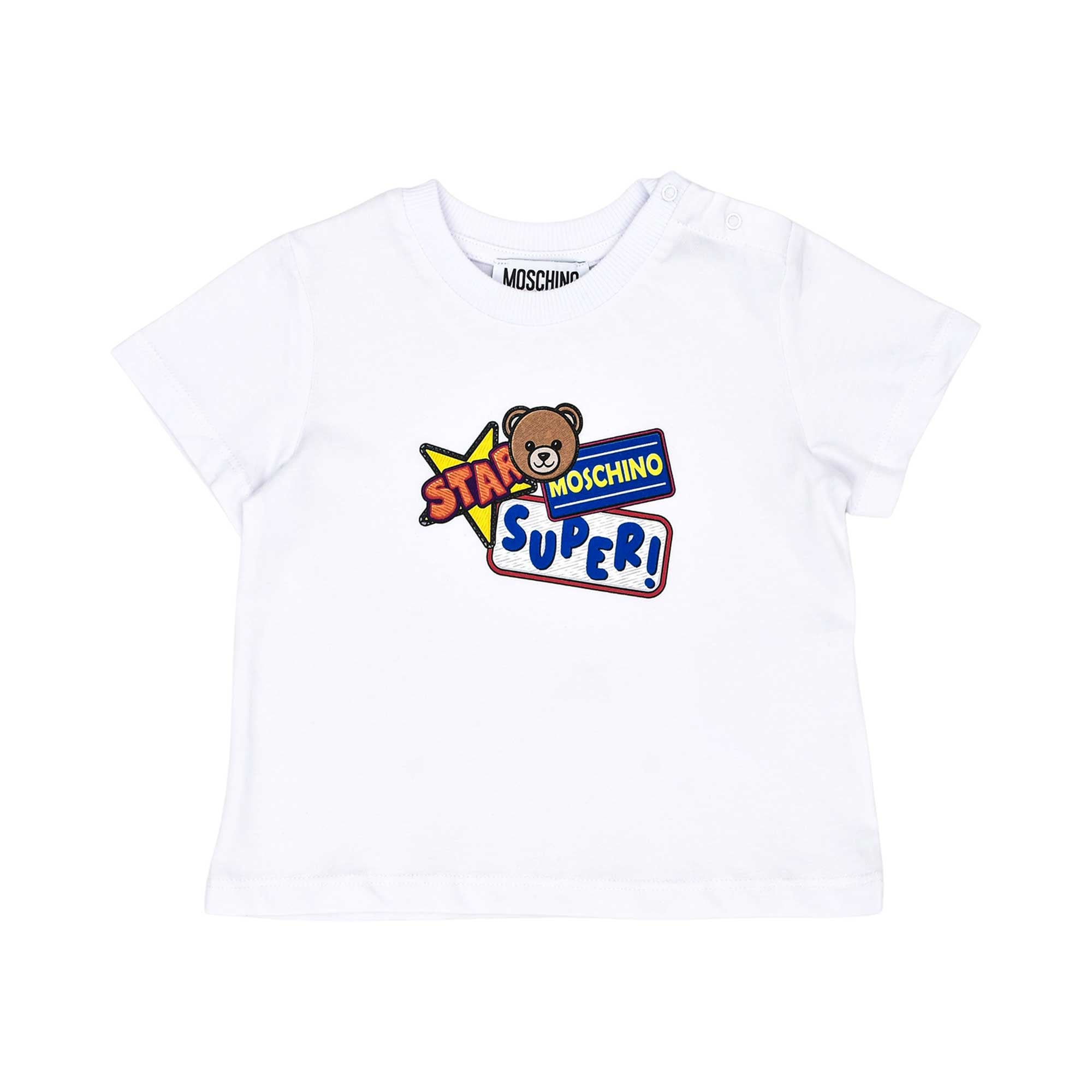 Close-up of the white cotton T-shirt showcasing the detailed "SUPER!" graphic and snap-button shoulder.