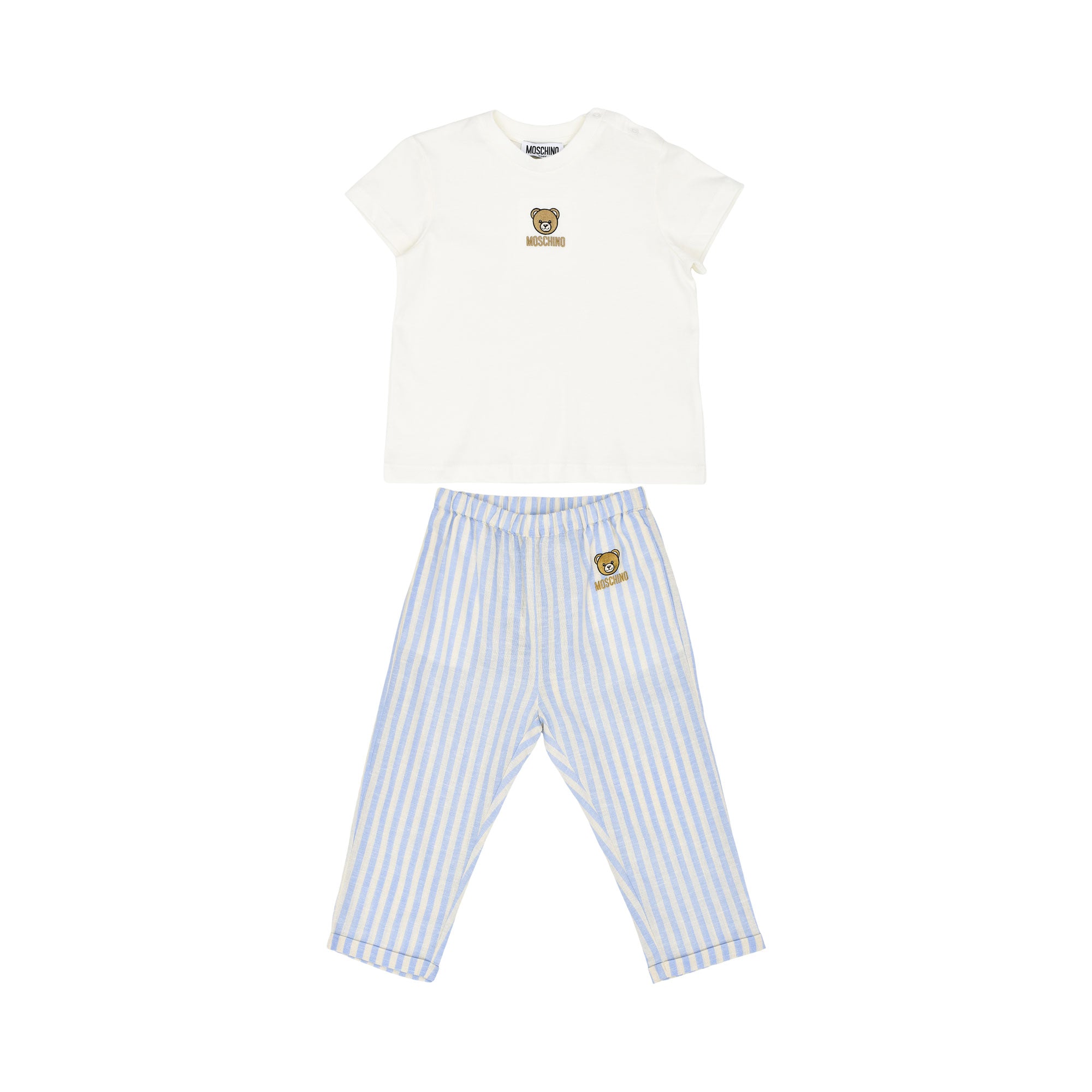 A Moschino Baby two-piece outfit featuring a white T-shirt with a teddy bear logo and blue-and-white striped linen trousers.