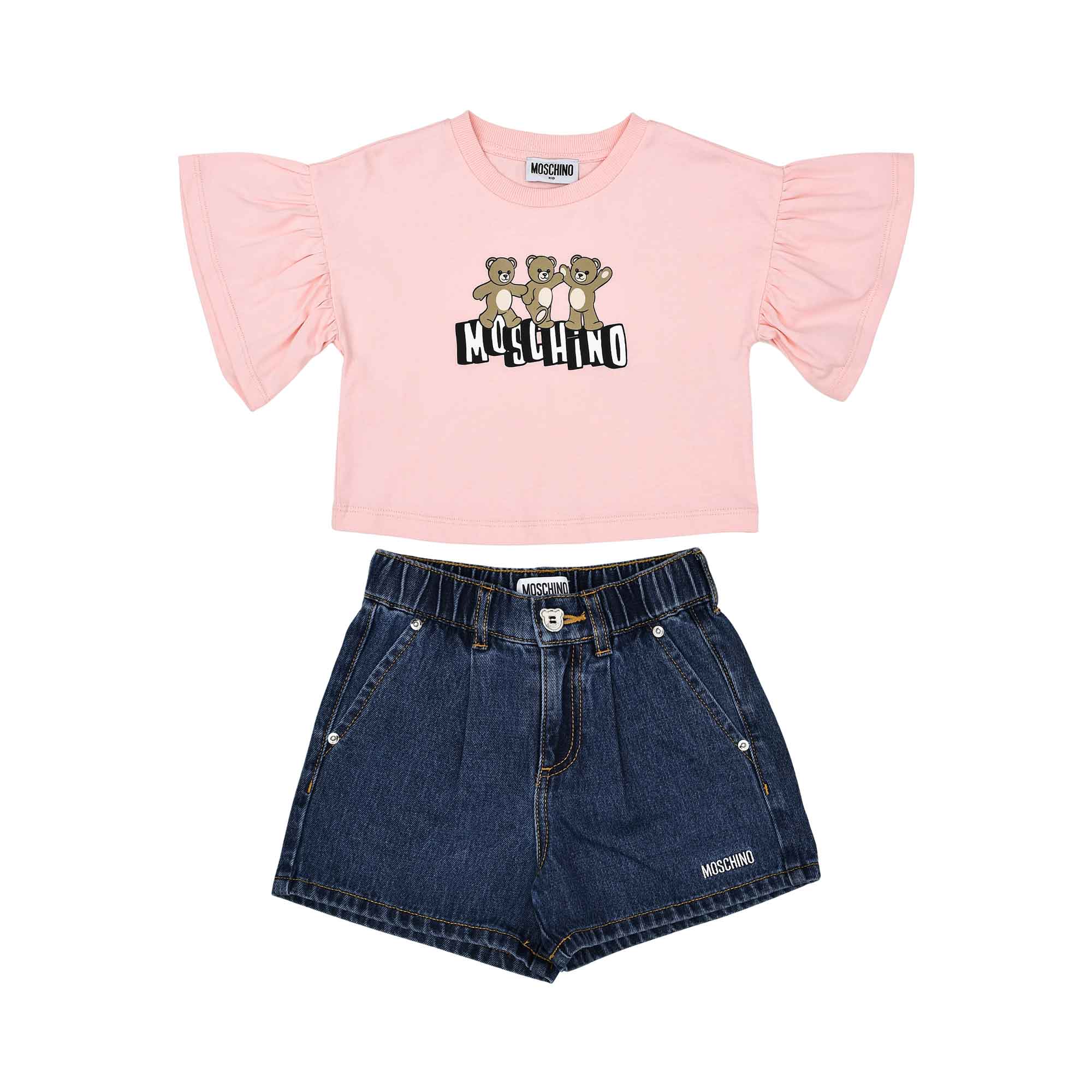 A children's clothing set featuring a pink ruffled-sleeve T-shirt with a teddy bear graphic and dark denim shorts.