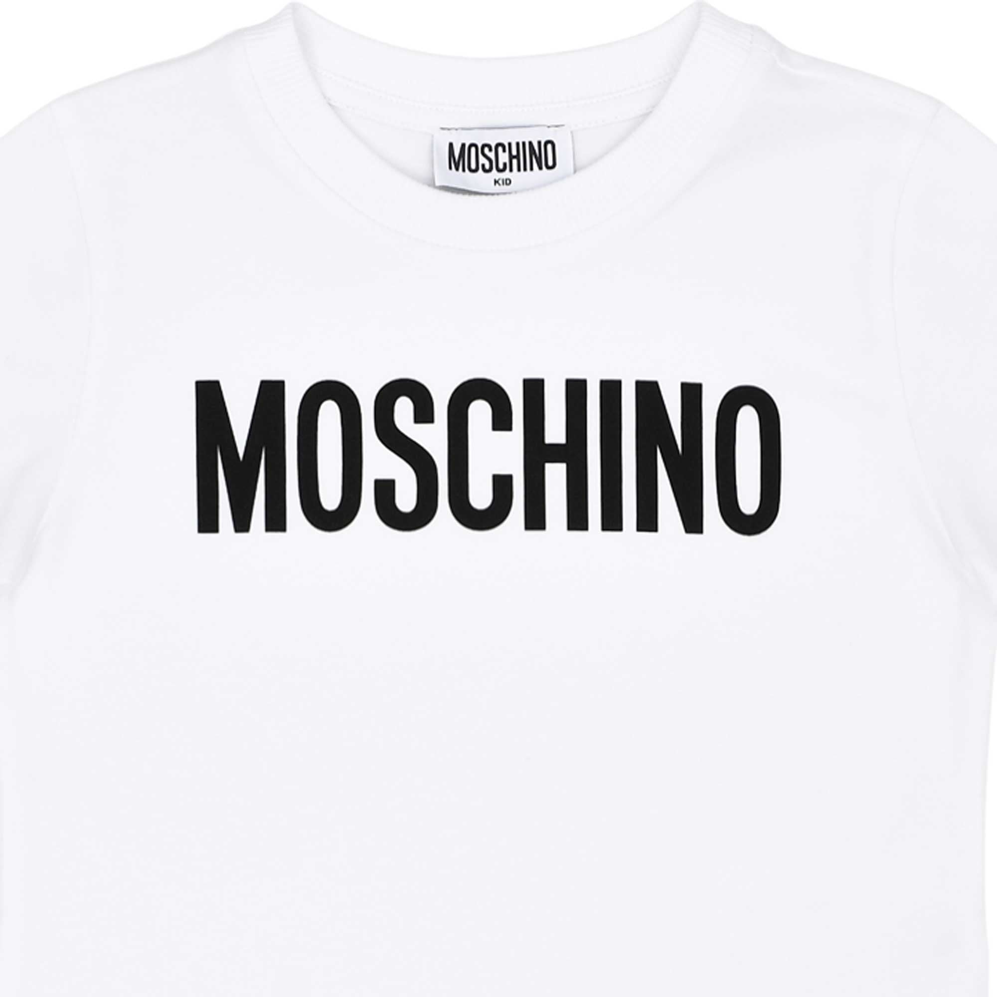 White t-shirt with 'Moschino' logo on a white background.