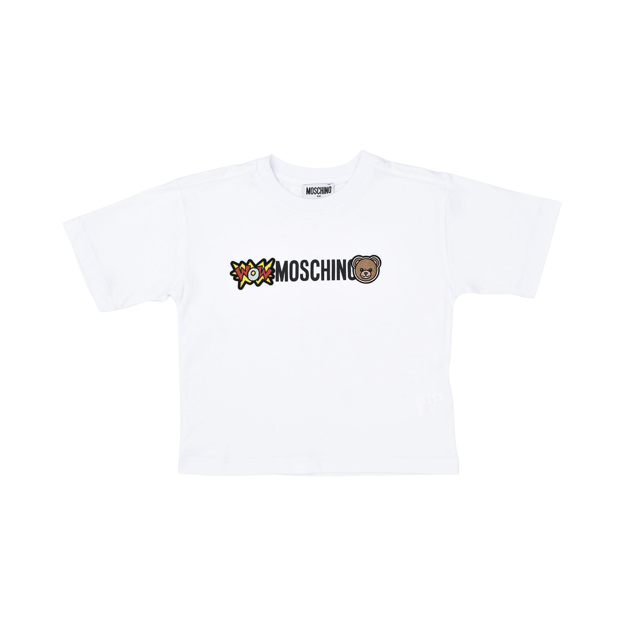 Detailed view of the white Moschino Kid T-shirt highlighting the "WOW" starburst and Teddy Bear logo.