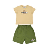 Front view of a Moschino Baby two-piece set featuring a beige short-sleeved T-shirt with a central Teddy Bear logo and khaki green cotton shorts.