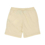 Rear view of the buttercream yellow Moschino Baby shorts showing the comfortable jersey construction and ribbed waist.