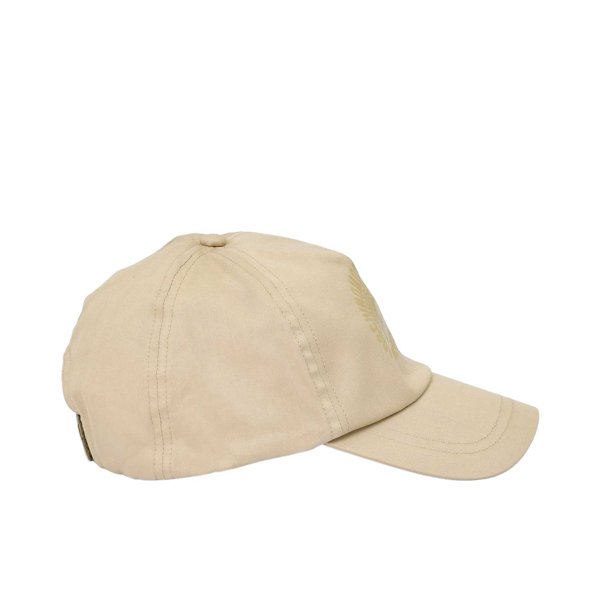 A left-side angled view showing the smooth five-panel construction and the cohesive beige colorway of the Moschino cap.