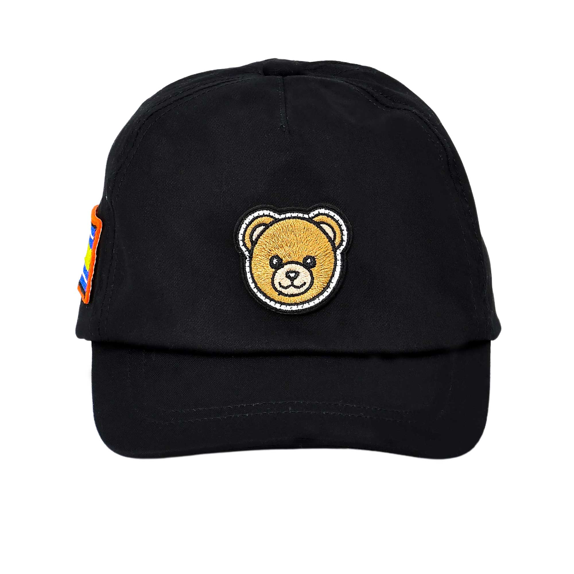 Front view of a black Moschino Kids baseball cap featuring a central embroidered brown Teddy Bear patch and a side logo patch.