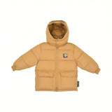 Front view of a Moschino Kids boys puffer jacket in camel brown, featuring horizontal quilting, a large padded hood, two front flap pockets, and a Teddy Bear chest patch.