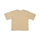 Back view of the plain beige cotton Moschino Kids T-shirt showing its relaxed fit and high-quality stitching.