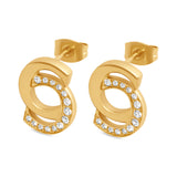 A close-up studio shot of the Marina earring face, showcasing the alternating pavé and inlaid clear crystal loops set into gold.