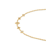 Close-up shot of the Francesca necklace links, highlighting the crystal-paved diamond frames and the central mother-of-pearl monogram motif.