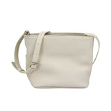 Embrace clean lines and effortless utility with the MUNI Grained Leather Crossbody.