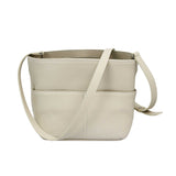 Embrace clean lines and effortless utility with the MUNI Grained Leather Crossbody.
