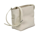 Embrace clean lines and effortless utility with the MUNI Grained Leather Crossbody.