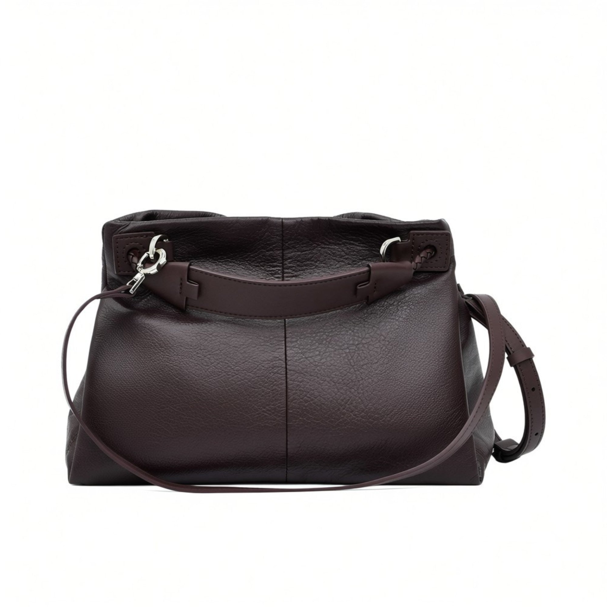 Back view of a brown MUNI leather shoulder bag showing the flat panel structure and strap attachments at BLUE SALON.