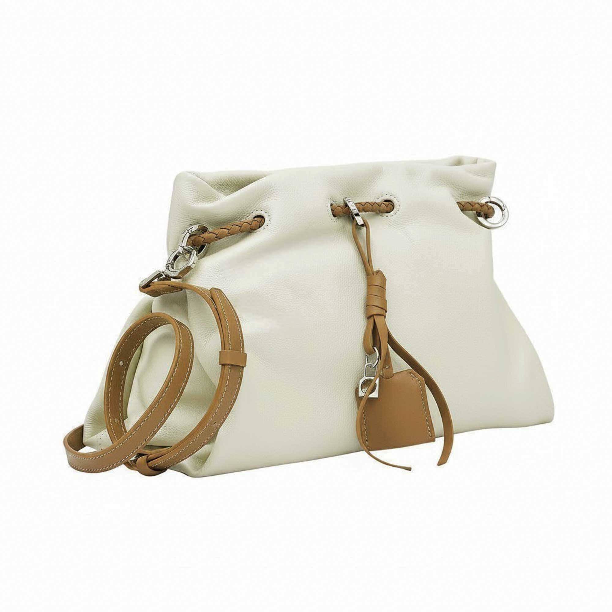 Front-angled perspective of a white leather MUNI shoulder bag showing its slouchy silhouette, exclusively at BLUE SALON.