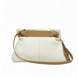 Back view of a light green MUNI leather shoulder bag showing the flat panel structure and strap attachments at BLUE SALON.