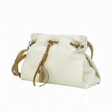 Side-angled view of a white leather MUNI shoulder bag with tassel details, showcased by BLUE SALON.