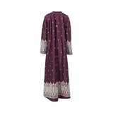 The rear view of a NERO plum-colored maxi dress showing a seamless back with scattered small embroidered accents and a wide, intricate border of arch-shaped embroidery at the bottom hem.