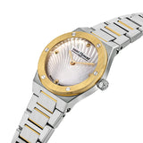 Silver-toned octagonal watch with gold-toned bezel, white mother-of-pearl dial with radiating fan pattern, gold-toned hands,
