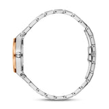 Side view of a watch with a rose gold-toned bezel, silver-toned case, and silver-toned metal link band. Silver-toned crown ha
